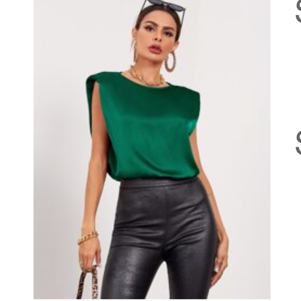 Solid sleeveless shoulder pad satin top